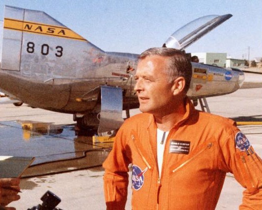 Thompson poses in front of the M2-F2 lifting body aircraft after his first flight in 1966