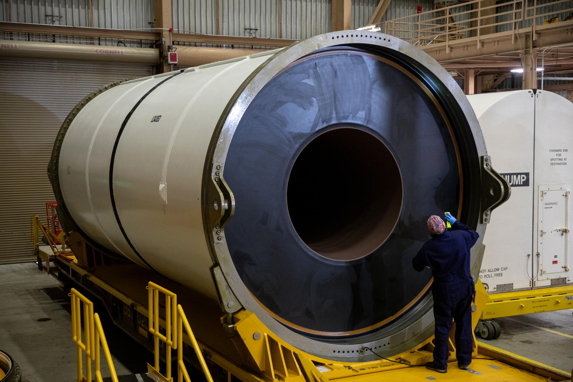 The right forward center segment of the Space Launch System solid rocket boosters is processed.