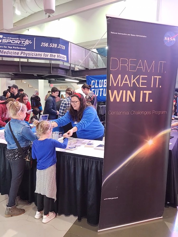 Marshall team member Savannah Bullard shares details of the Centennial Challenges Program with Space Night attendees.