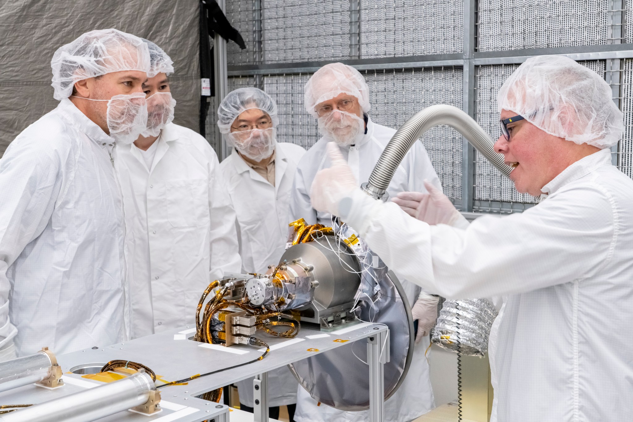 People working in a clean room environment