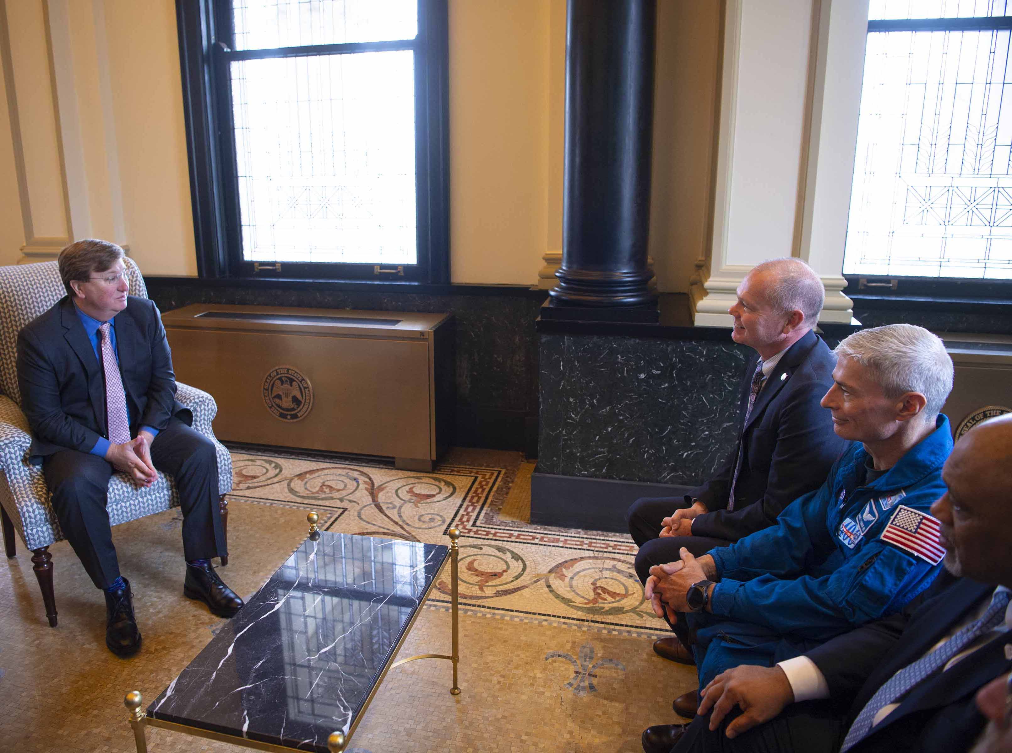 NASA Stennis Acting Center Director John Bailey, NASA astronaut Mark Vande Hei, and NASA Shared Service Center Acting Executive Director Ken Newton meet with Mississippi Gov. Tate Reeves