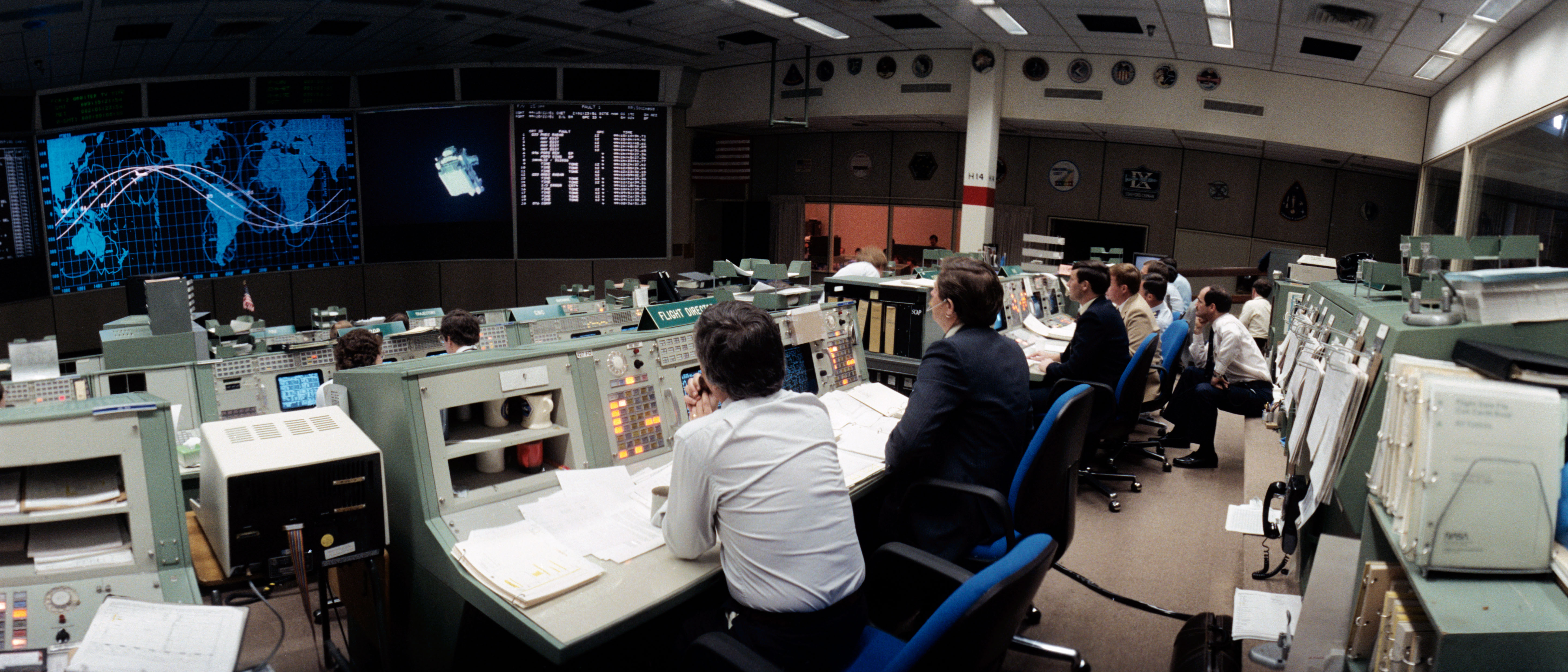 Mission Control during the first STS-41C spacewalk as NASA astronaut George D. “Pinky” Nelson flies the Manned Maneuvering Unit to the Solar Max satellite