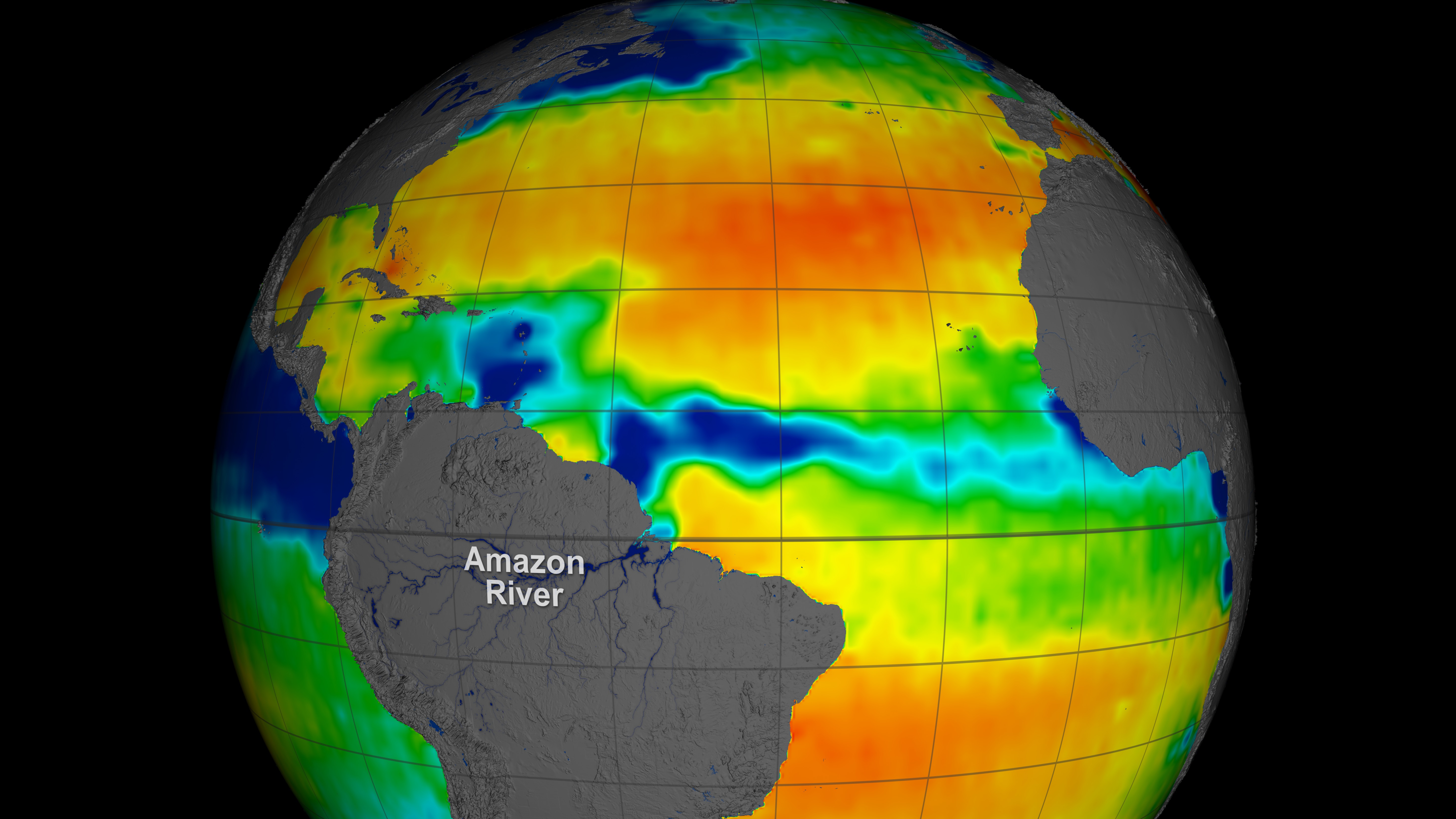 A plume of low salinity water is shown here in dark blue, drifting away from the river mouth on ocean currents. The blue blob to the northwest is the Orinoco River plume.