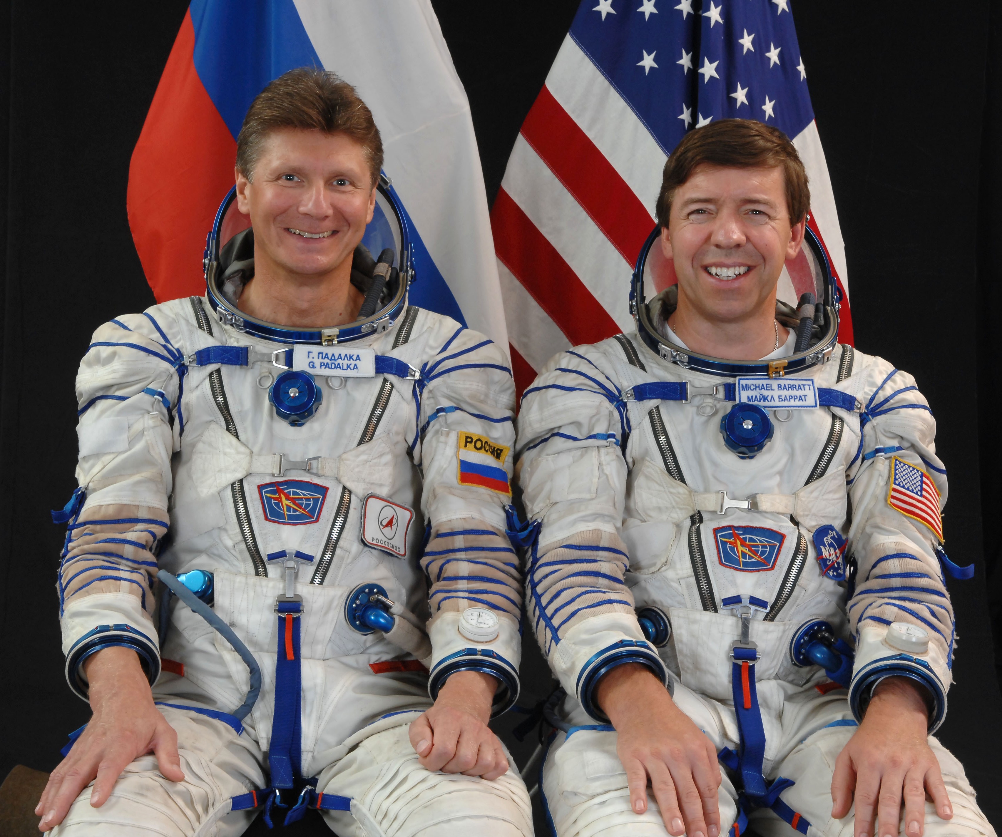 Gennadi I. Padalka of Roscosmos, left, and NASA astronaut Michael M. Barratt of Expedition 19