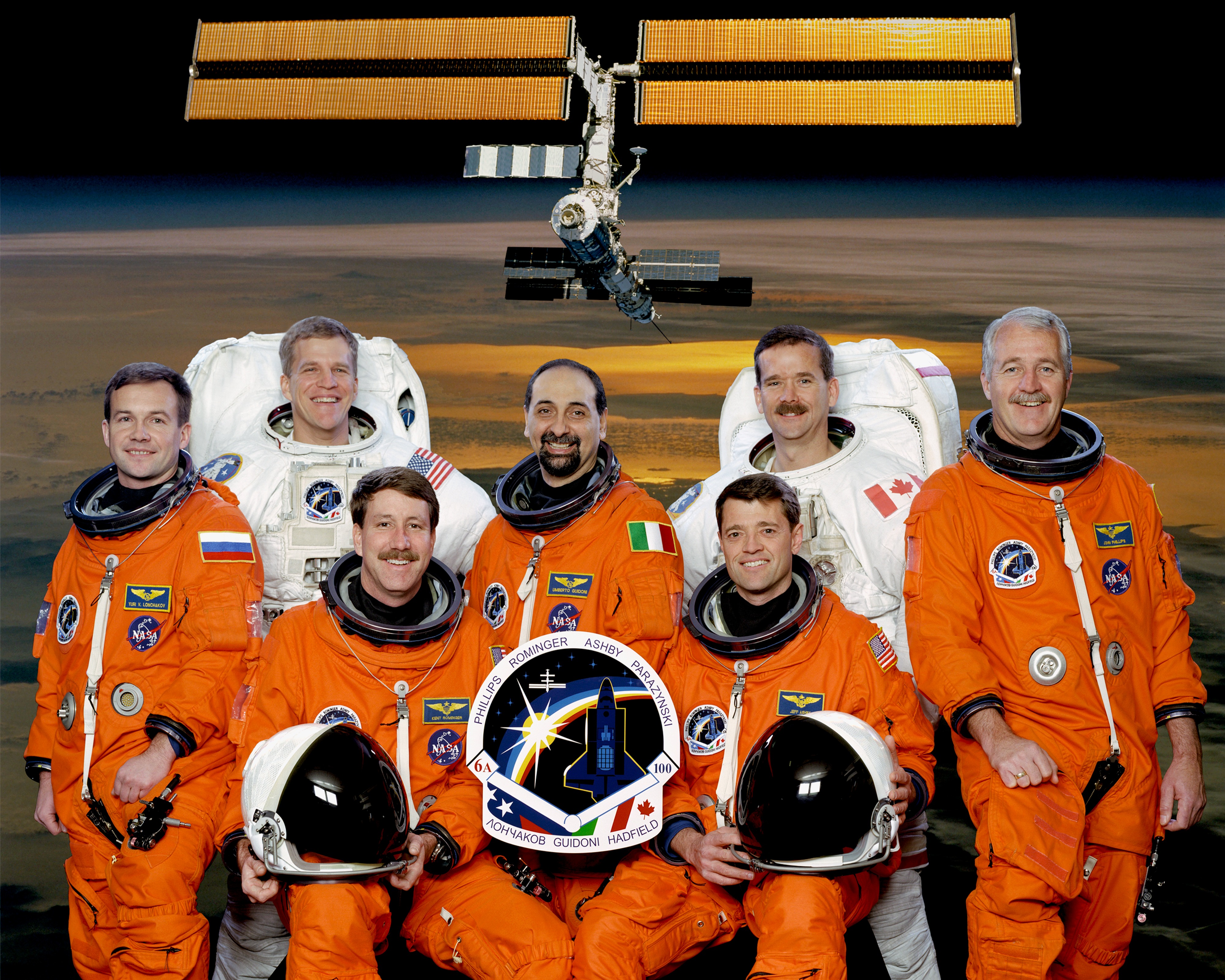 STS-100 included Umberto Guidoni, center, the first European Space Agency (ESA) astronaut to visit the space station