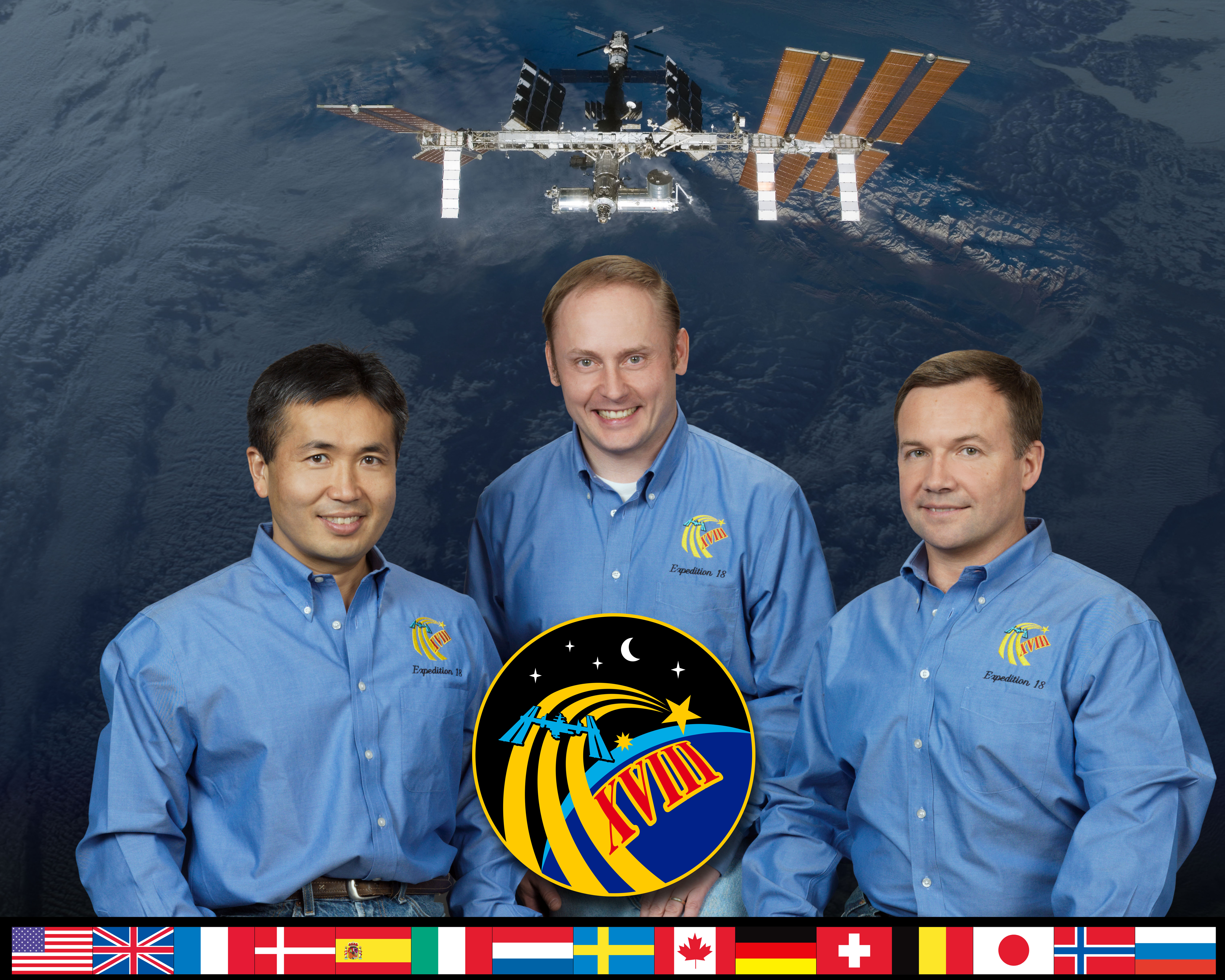 Expedition 19 crew of Koichi Wakata of the Japan Aerospace Exploration Agency, left, NASA astronaut E. Michael Fincke, and Yuri V. Lonchakov of Roscosmos