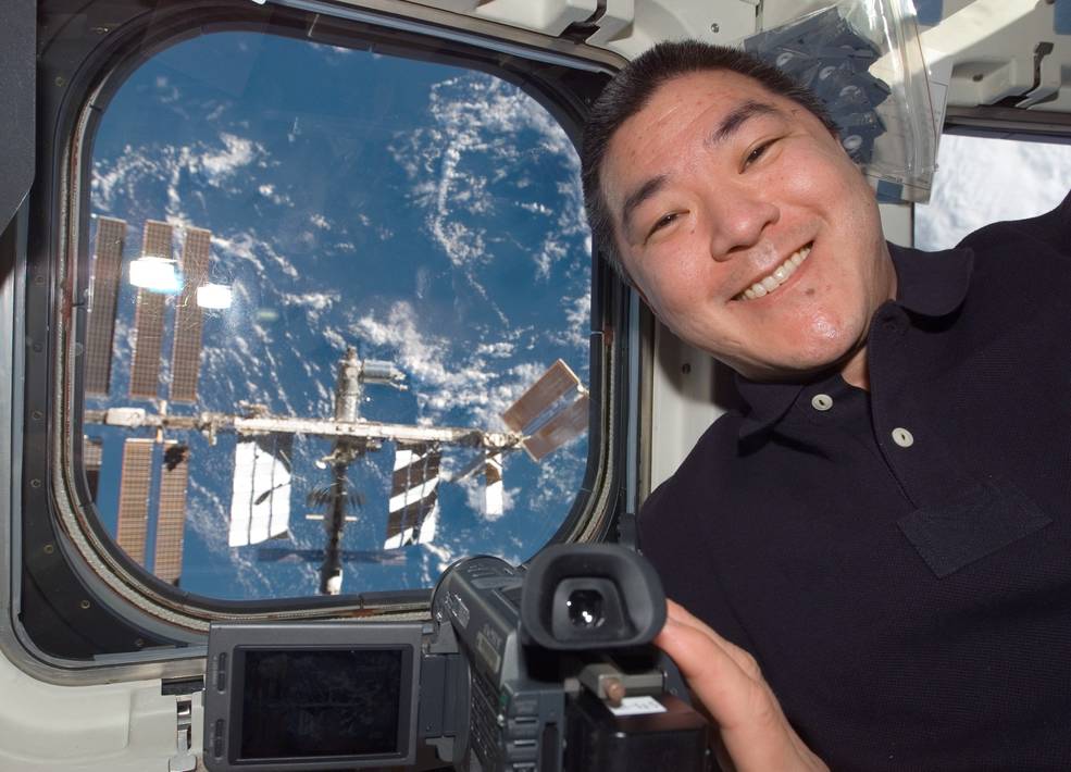 aapi_2021_40_tani_w_iss_in_window