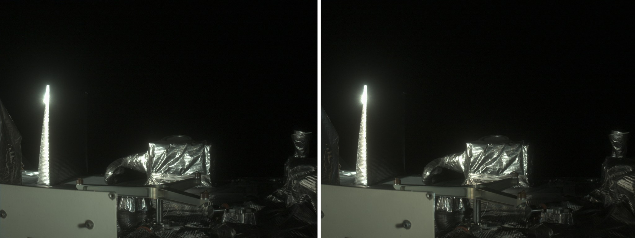 Two identical scenes are seen in a pair of side-by-side images. Against the pitch-black background of space, a boxy metallic satellite dominates the foreground. Glints of light are bouncing off the shiniest parts of the structure.