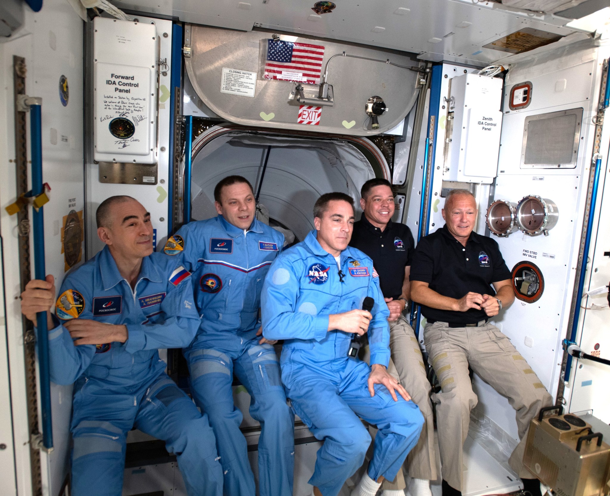 SpaceX Demo 2 crew pose for a picture aboard the space station