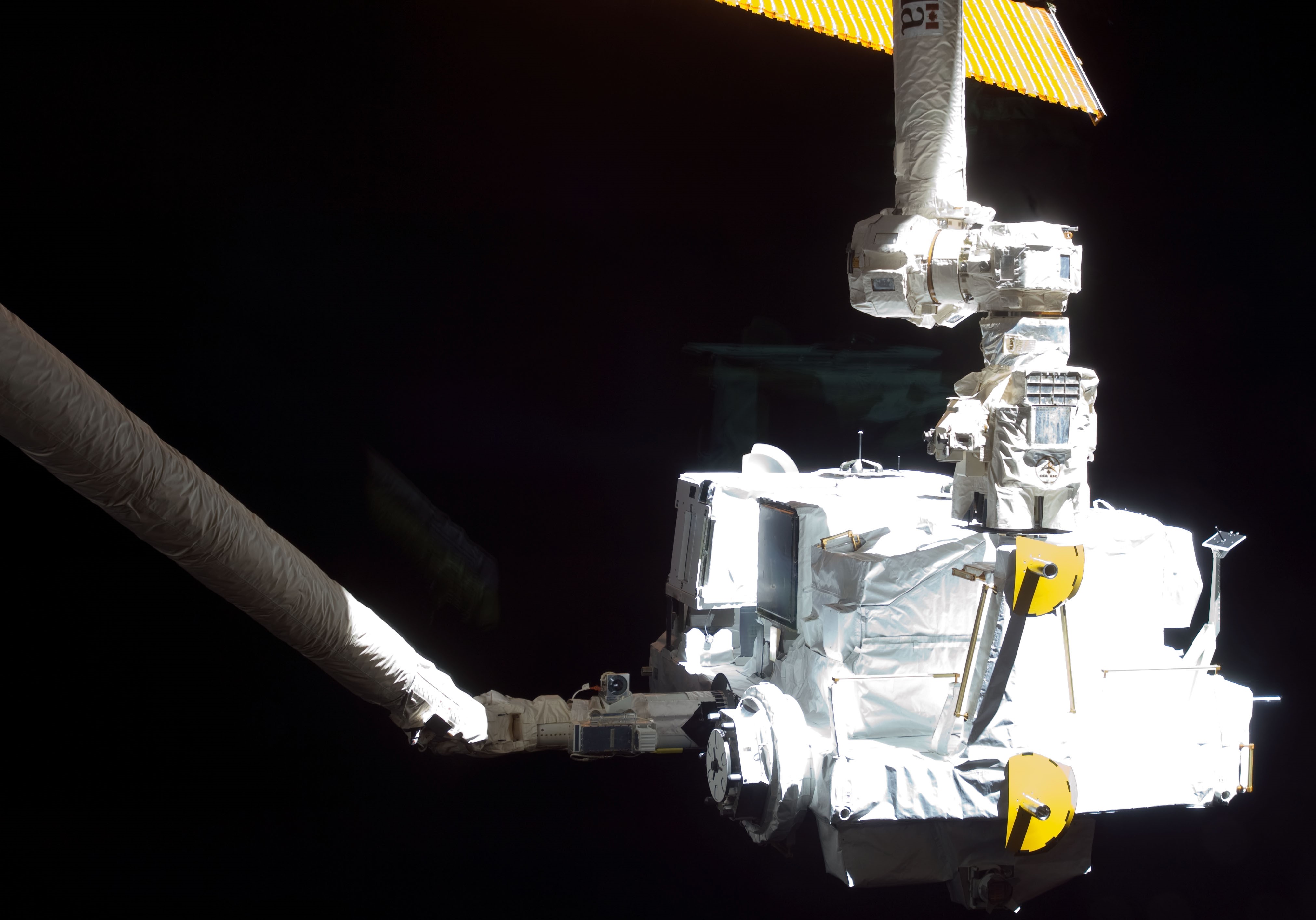 Transfer of the Kibo Experiment Logistics Module from the shuttle to the station