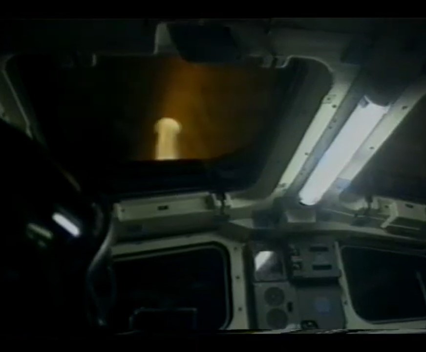 Flash of plasma seen through Columbia’s overhead window during reentry