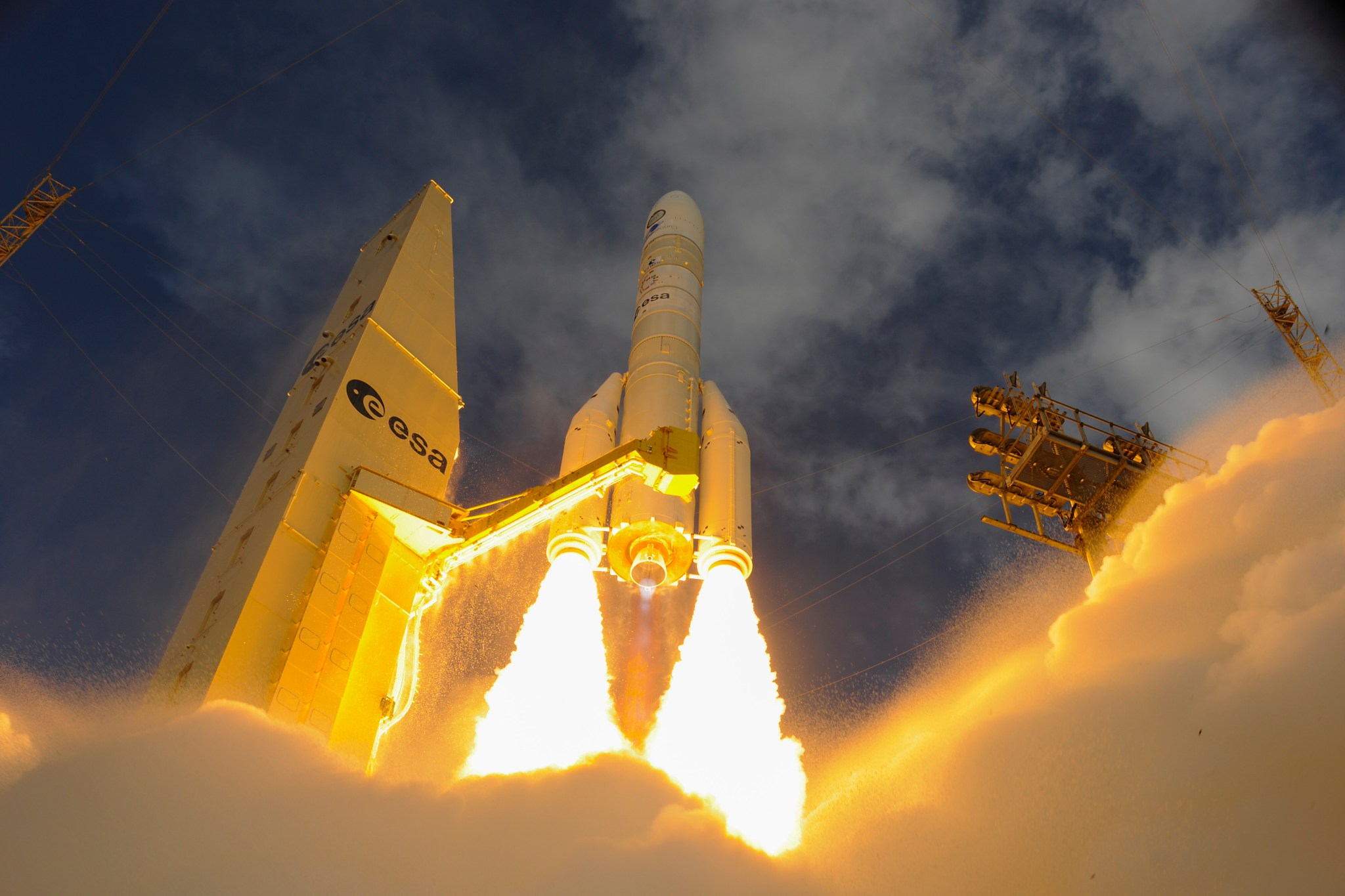 Image shows ESA's (European Space Agency) Ariane 6 rocket launching NASA's CURIE CubeSat from Europe's Spacesport, the Guiana Space Center in Kourou, French Guiana.