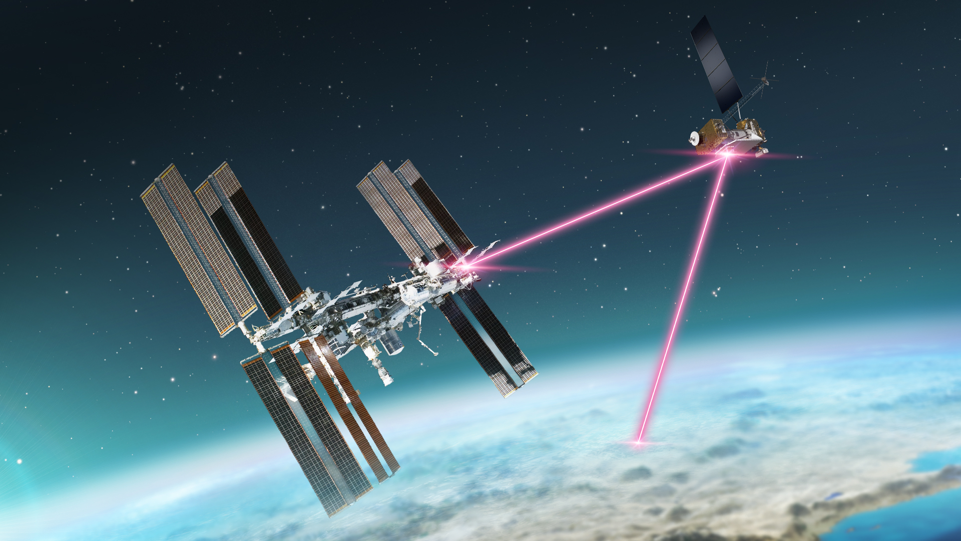 A graphic showing the International Space Station floating above the Earth’s surface in front of a blue starry background. A red beam of light is shown coming out of the space station to represent laser communications. The beam of light connects to a second spacecraft, LCRD, located in the upper right side of the image. A second red beam is seen coming out of the LCRD, connecting to Earth below.