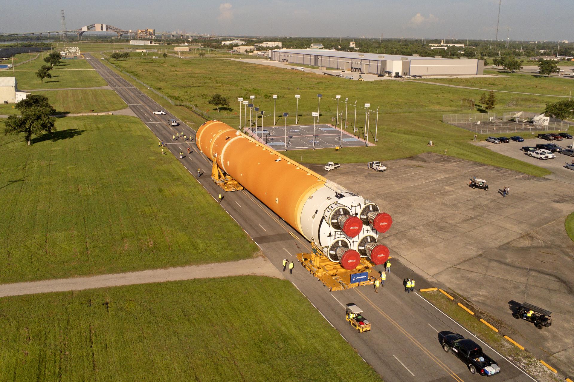 Team members on July 16 move the first core stage that will help launch the first crewed flight of NASA’s SLS (Space Launch System) rocket for the agency’s Artemis II mission. The move marked the first time a fully assembled Moon rocket stage for a crewed mission has rolled out from NASA’s Michoud Assembly Facility in New Orleans since the Apollo Program.