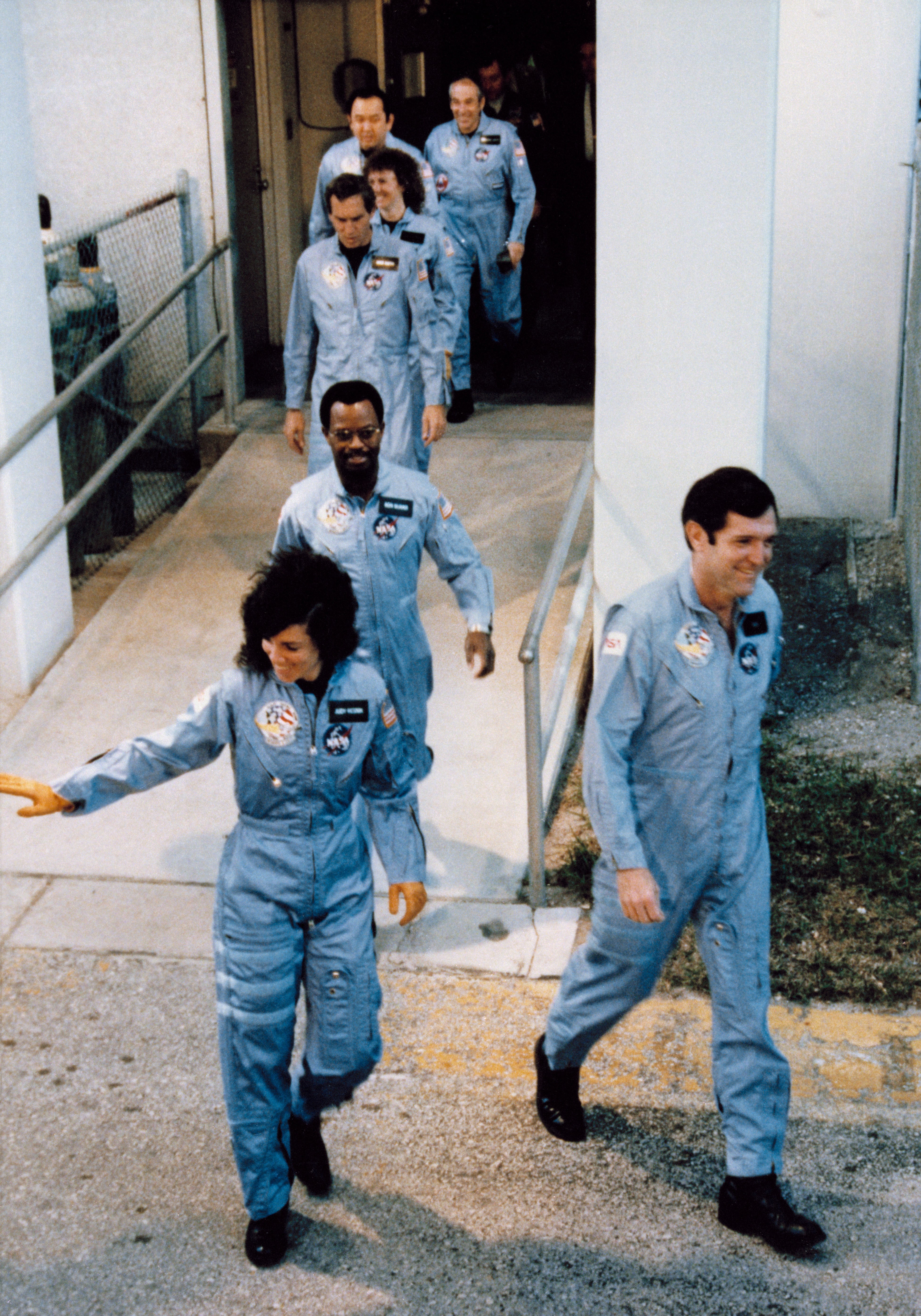 The STS-51L astronauts leave crew quarters on their way to Launch Pad 39B