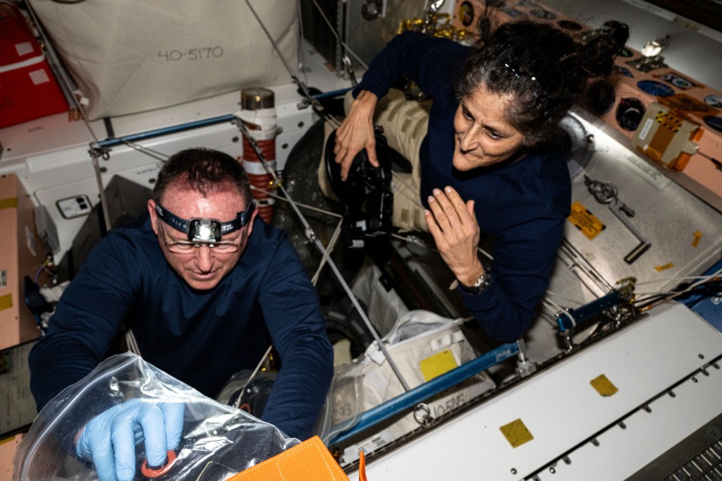 NASA astronauts Butch Wilmore and Suni Williams, Boeing's Crew Flight Test Commander and Pilot respectively, inspect safety hardware aboard the International Space Station.