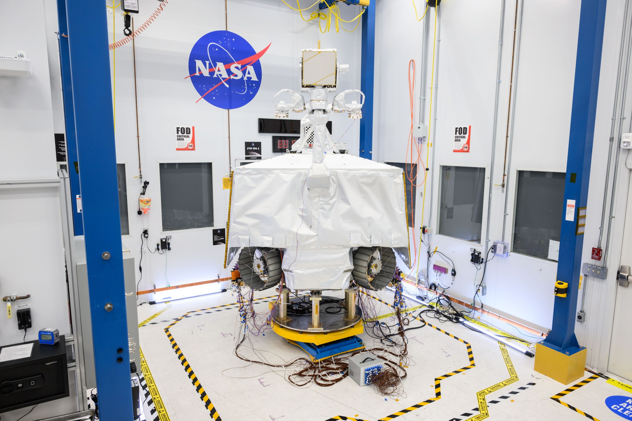 NASA’s VIPER robotic Moon rover is shown in a clean room at NASA’s Johnson Space Center in Houston.