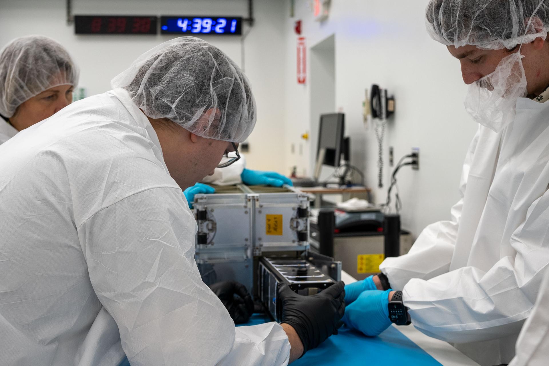 Technicians with the University of Kansas prepare their KUbeSat-1 for integration at Firefly’s Payload Processing Facility at Vandenberg Space Force Base, California on Thursday, April 25, 2024.