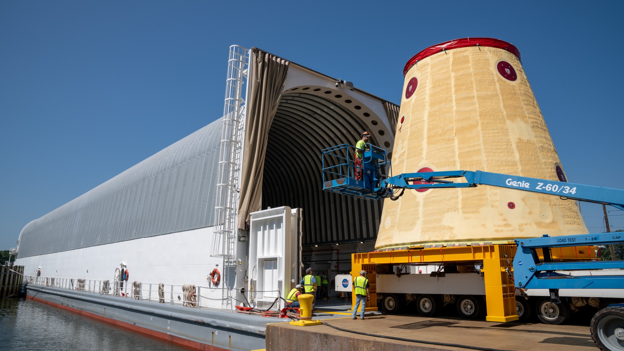 Crews moved the cone-shaped launch vehicle stage adapter out of NASA Marshall’s Building 4708 to the agency’s Pegasus barge on August 21. The barge will ferry the adapter first to NASA’s Michoud Assembly Facility, where it will pick up additional SLS hardware for future Artemis missions, and then travel to NASA Kennedy. In Florida, teams with NASA’s Exploration Ground Systems will prepare the adapter for stacking and launch.