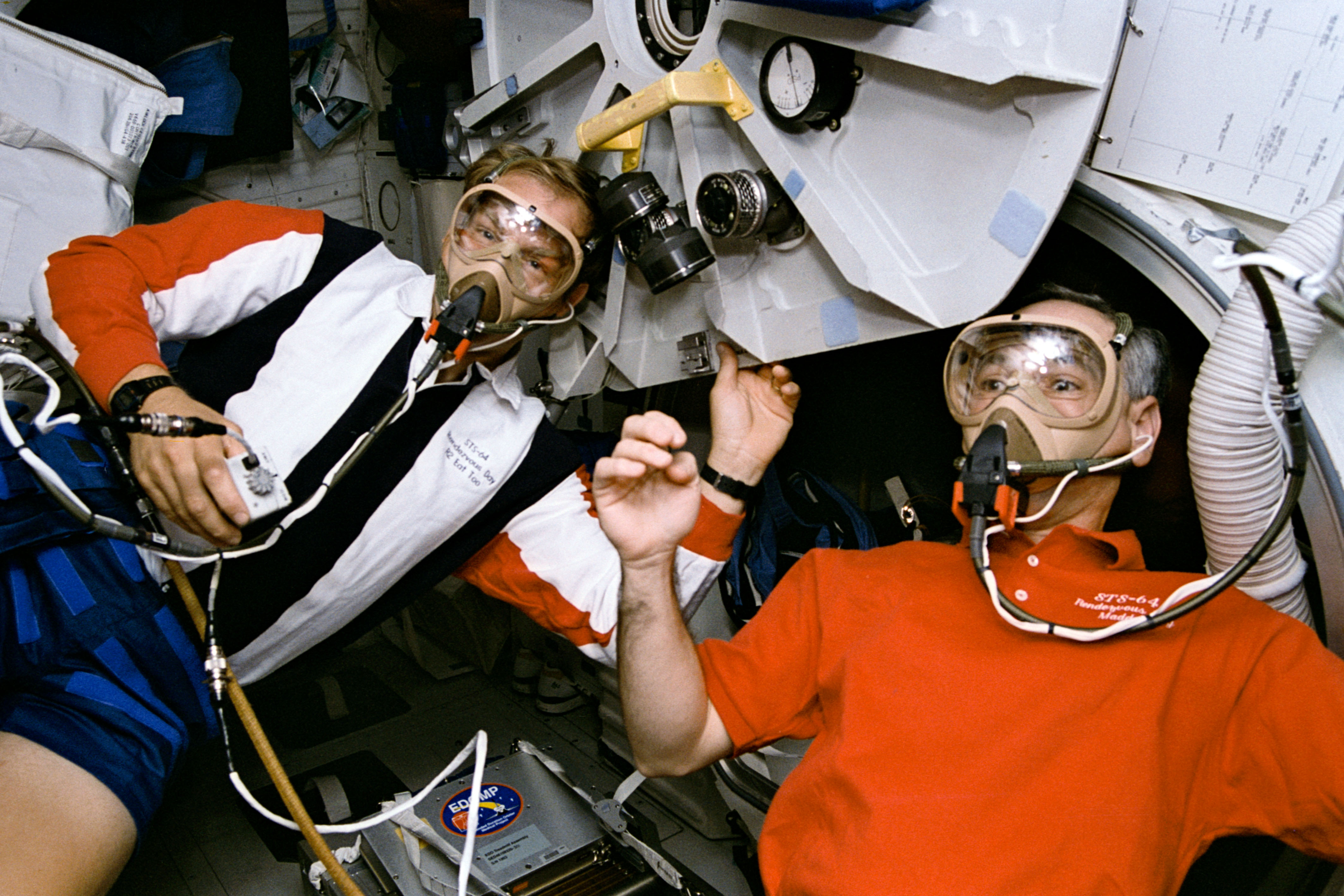 Astronauts Mark C. Lee, left, and Carl J. Meade during the 15-minute prebreathe prior to their spacewalk