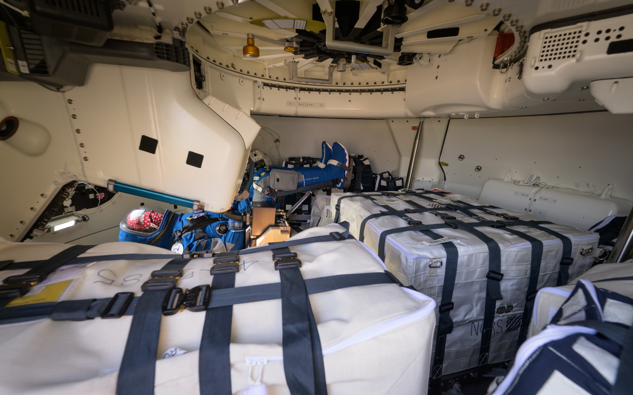 Cargo from the International Space Station is pictured inside Boeing’s Starliner spacecraft after it landed at White Sands Missile Range’s Space Harbor, May 25, 2022, in New Mexico for the company’s Orbital Flight Test-2 (Credits: NASA/Bill Ingalls).