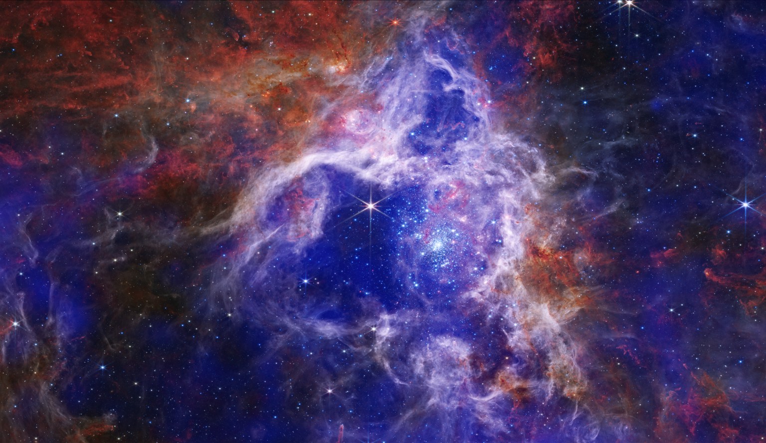 X-ray, Optical, & Infrared Composite of 30 Doradus (Tarantula Nebula).