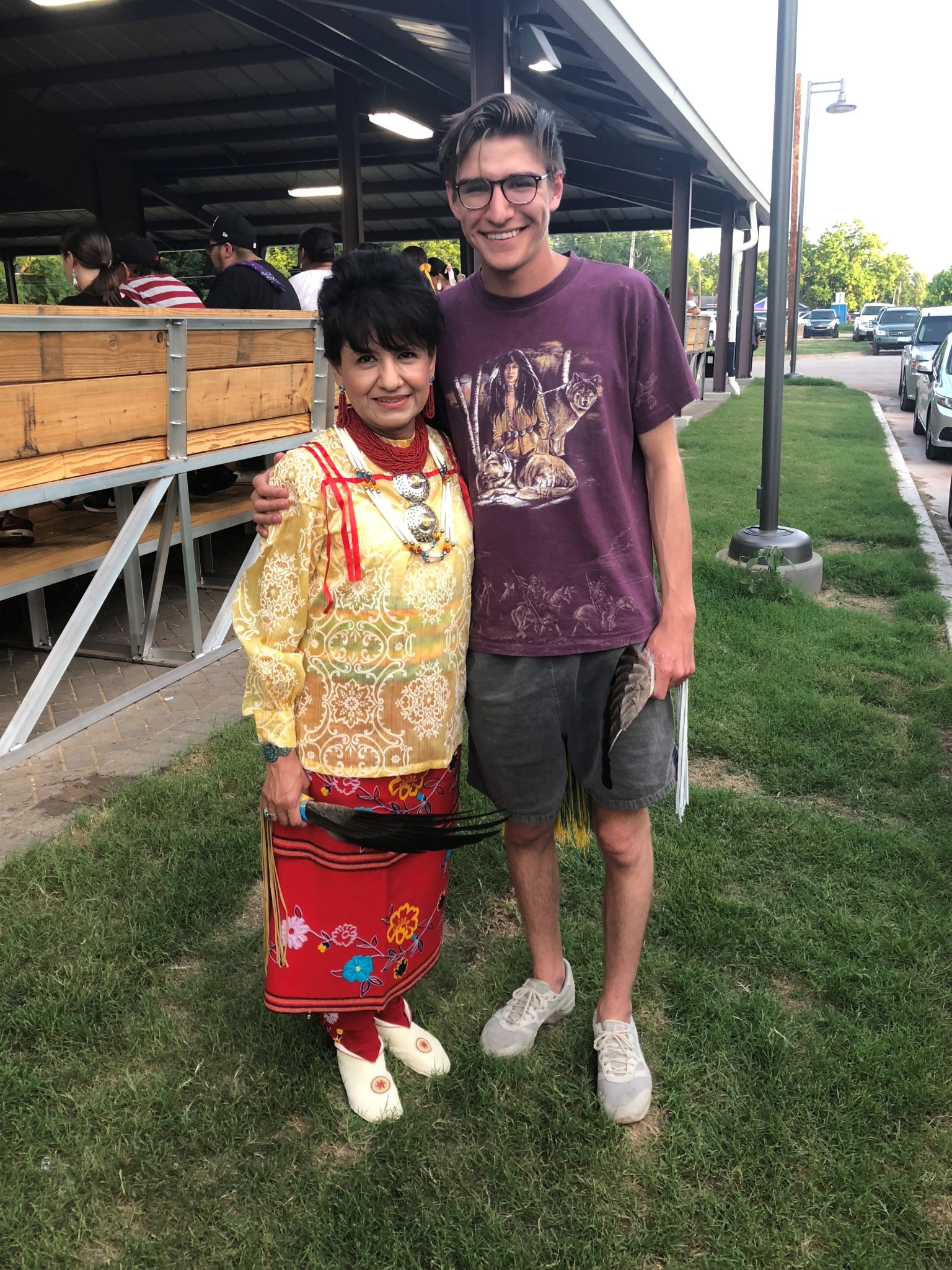 Basil Baldauff poses with a friend at a ceremonial indigenous tribal dance.